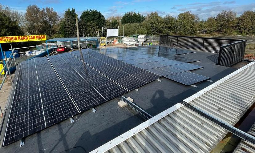 Commercial electrician working on an industrial electrical panel